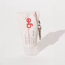 Charm bag GE Beauty com leave-in travel size como brinde promocional